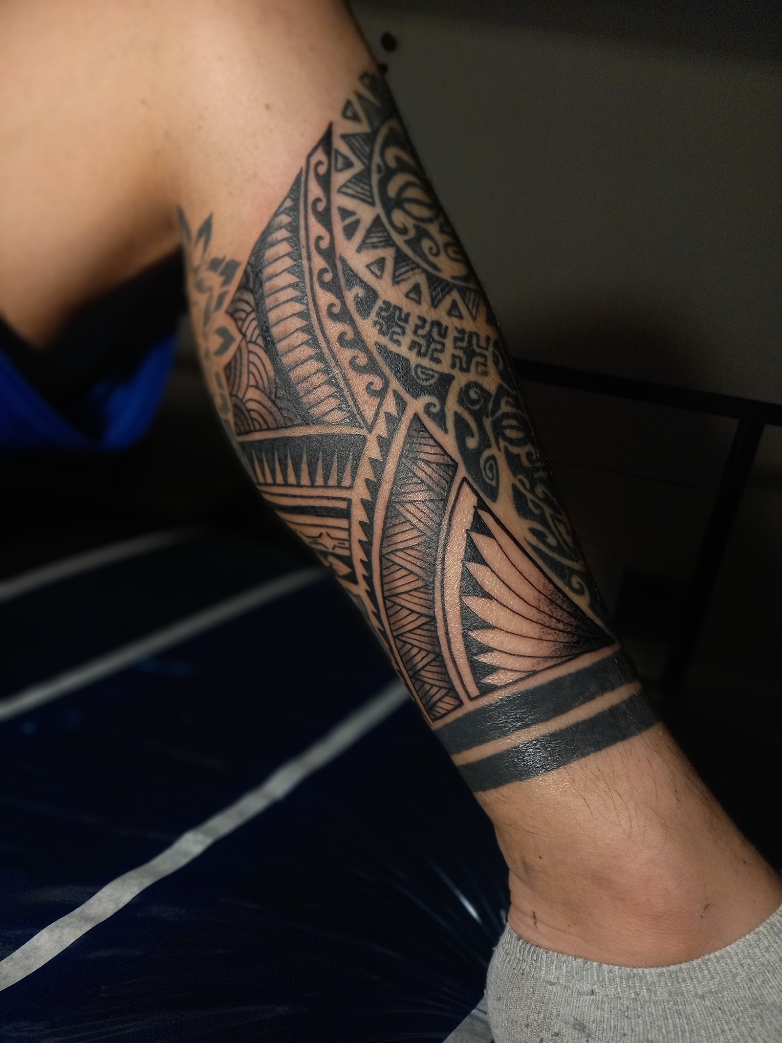 Fine line floral tattoo